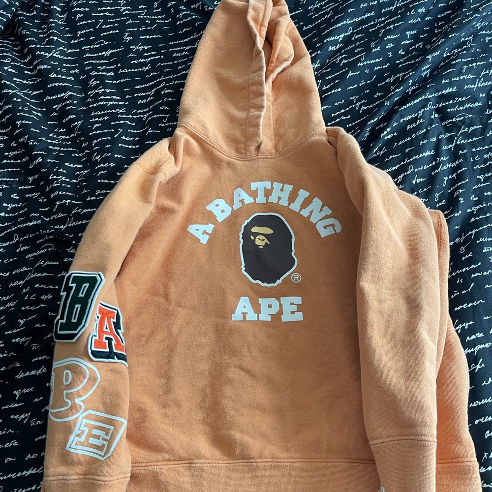 A Bathing Ape Orange Graphic sweatsuit